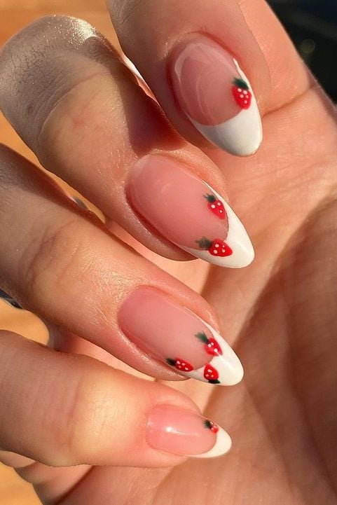 Strawberry nails, white french tip nails with cute little strawberries