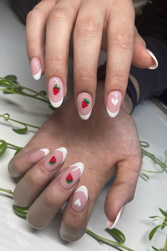 Strawberry nails, french tip nails with strawberries and white heart design