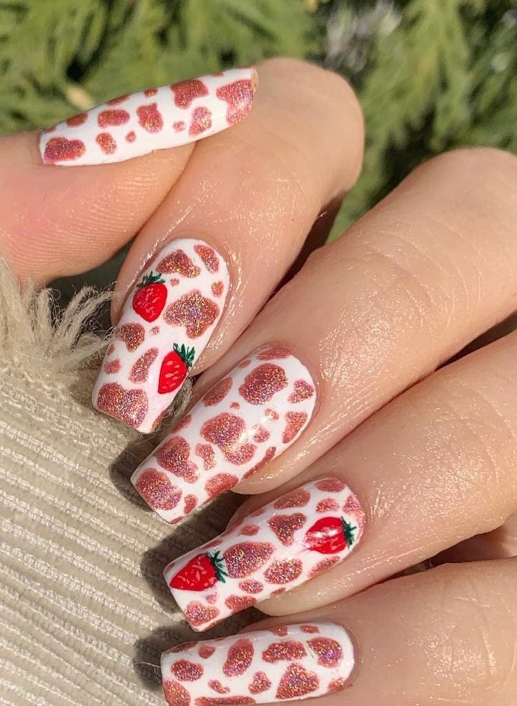Strawberry nails, glittery cow print nails with strawberries